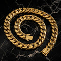 Gold Cuban link chain on black marble